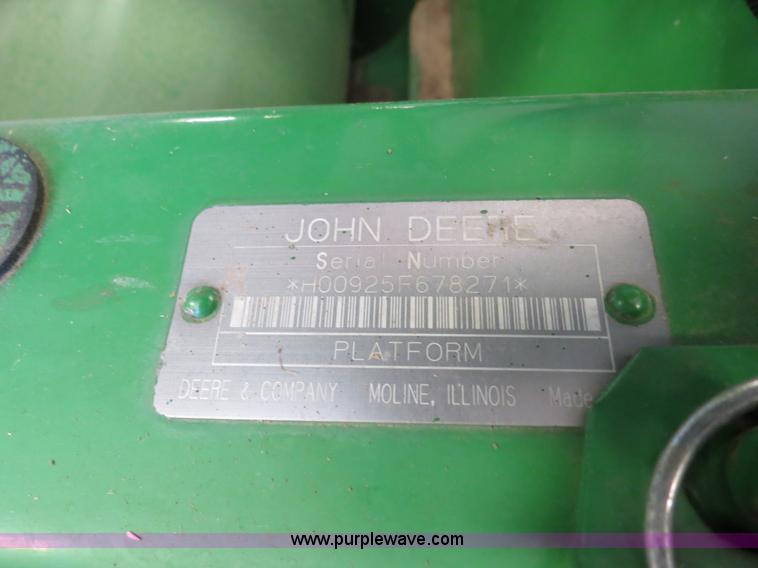 image for item B4730 1998 John Deere 925 25' flex platform header with 2011 Golden Belt header trailer
