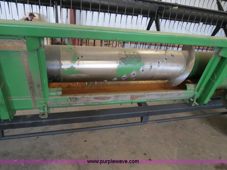 image for item B4730 1998 John Deere 925 25' flex platform header with 2011 Golden Belt header trailer