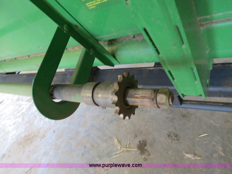 image for item B4730 1998 John Deere 925 25' flex platform header with 2011 Golden Belt header trailer