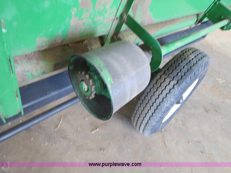 image for item B4730 1998 John Deere 925 25' flex platform header with 2011 Golden Belt header trailer