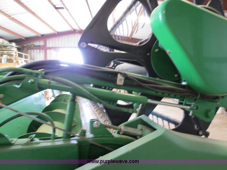 image for item B4730 1998 John Deere 925 25' flex platform header with 2011 Golden Belt header trailer