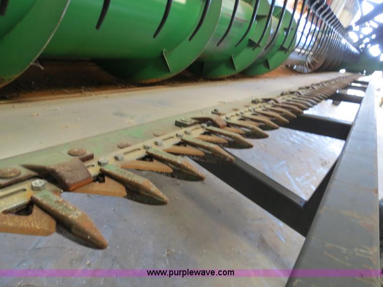 image for item B4730 1998 John Deere 925 25' flex platform header with 2011 Golden Belt header trailer