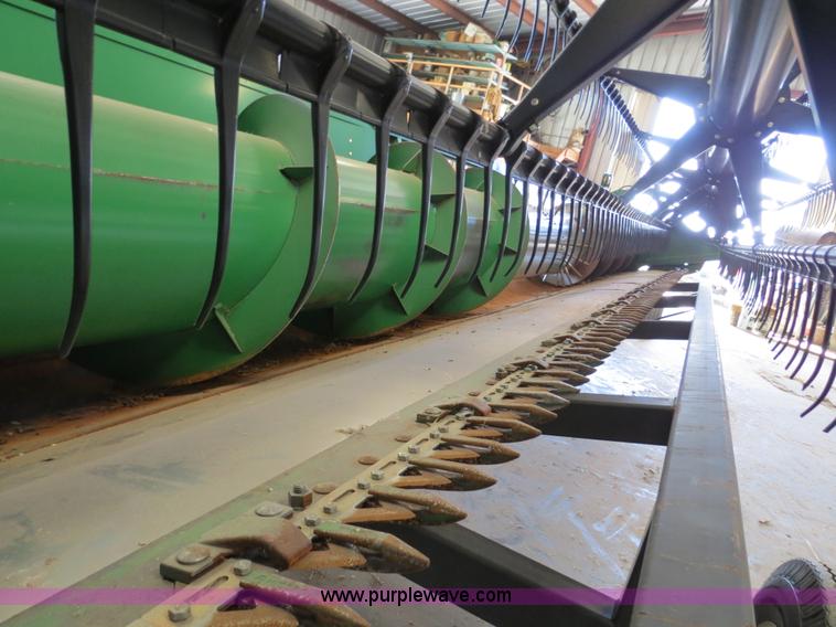 image for item B4730 1998 John Deere 925 25' flex platform header with 2011 Golden Belt header trailer