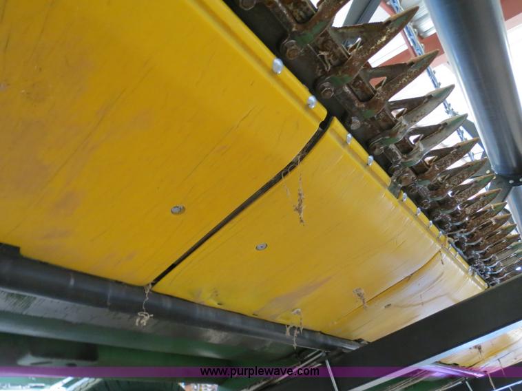 image for item B4730 1998 John Deere 925 25' flex platform header with 2011 Golden Belt header trailer
