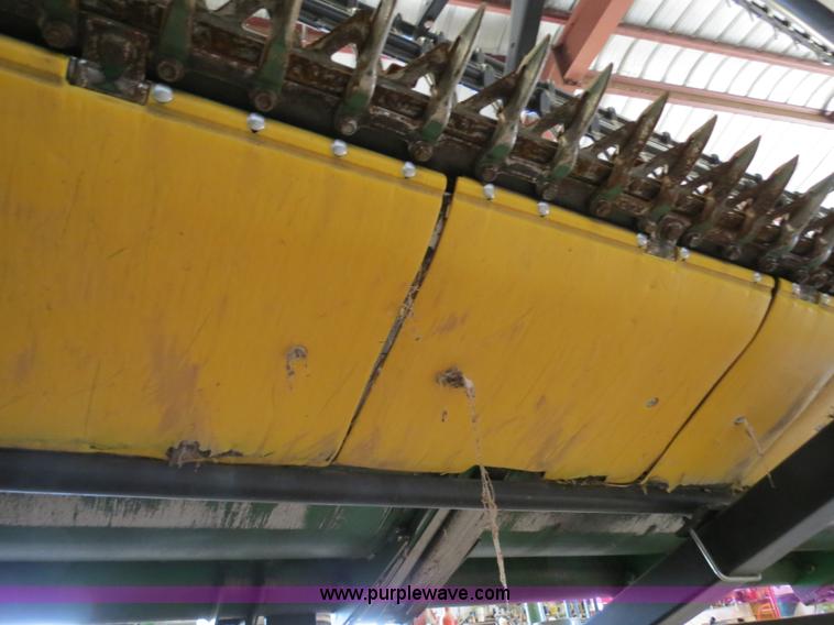 image for item B4730 1998 John Deere 925 25' flex platform header with 2011 Golden Belt header trailer