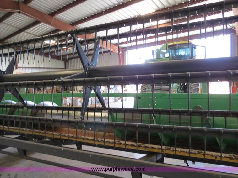 image for item B4730 1998 John Deere 925 25' flex platform header with 2011 Golden Belt header trailer