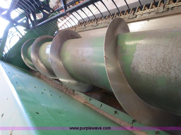 image for item B4730 1998 John Deere 925 25' flex platform header with 2011 Golden Belt header trailer