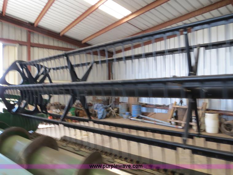 image for item B4730 1998 John Deere 925 25' flex platform header with 2011 Golden Belt header trailer