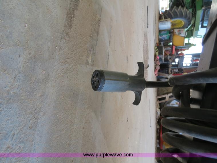 image for item B4730 1998 John Deere 925 25' flex platform header with 2011 Golden Belt header trailer