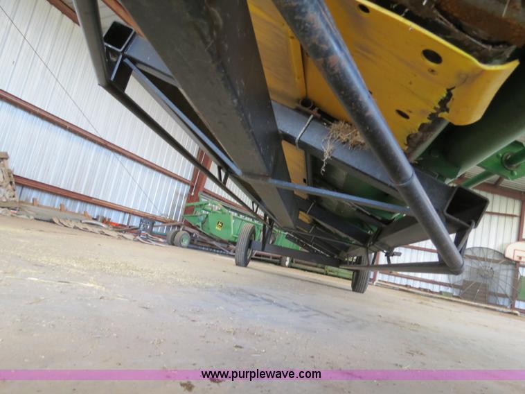 image for item B4730 1998 John Deere 925 25' flex platform header with 2011 Golden Belt header trailer