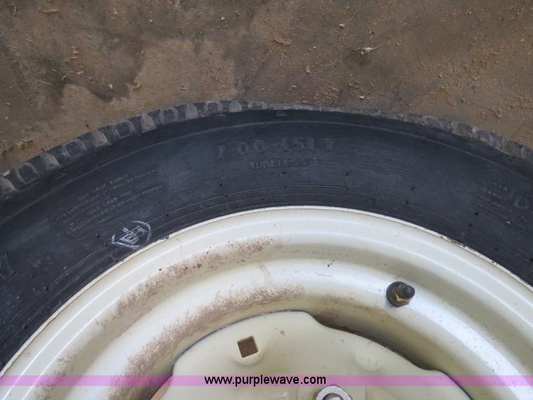 image for item B4730 1998 John Deere 925 25' flex platform header with 2011 Golden Belt header trailer