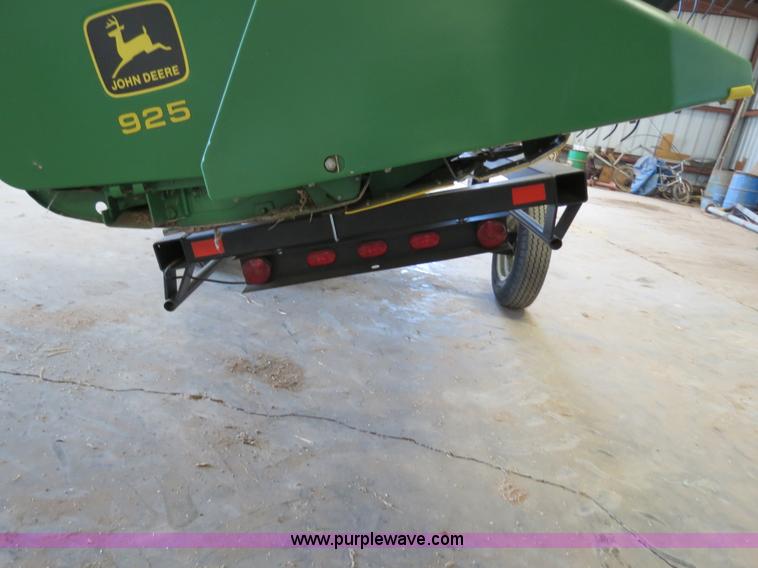 image for item B4730 1998 John Deere 925 25' flex platform header with 2011 Golden Belt header trailer