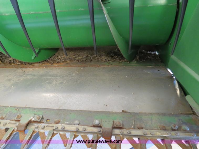 image for item B4730 1998 John Deere 925 25' flex platform header with 2011 Golden Belt header trailer