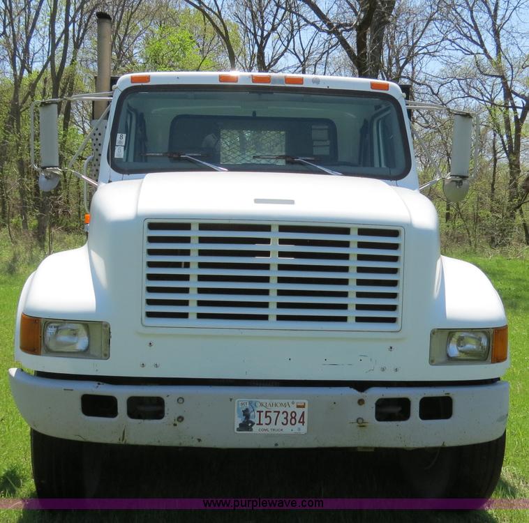 image for item B4750 1998 International 4700 flatbed truck