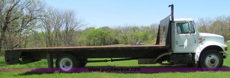 image for item B4750 1998 International 4700 flatbed truck