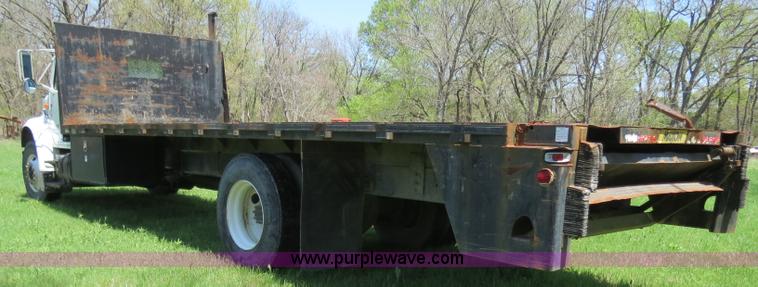 image for item B4750 1998 International 4700 flatbed truck