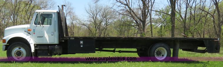 image for item B4750 1998 International 4700 flatbed truck
