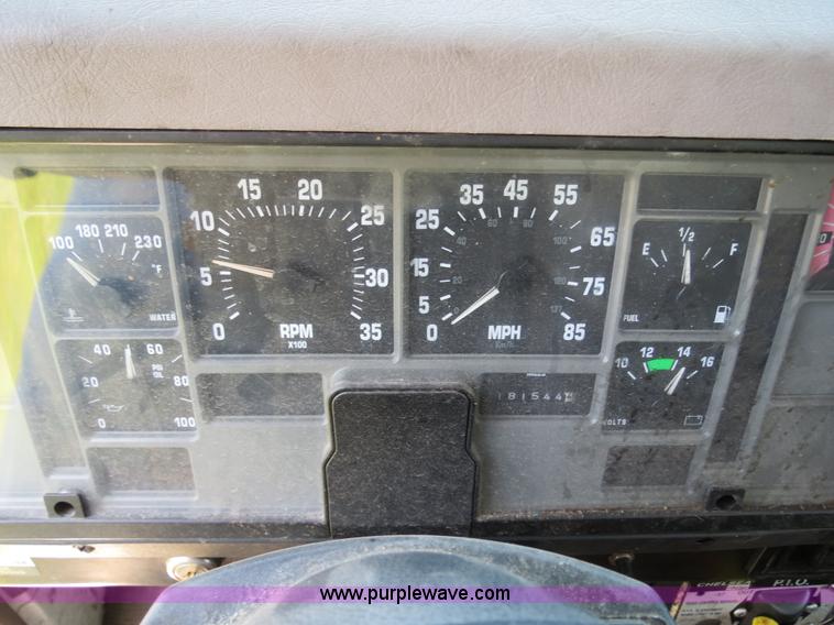 image for item B4750 1998 International 4700 flatbed truck