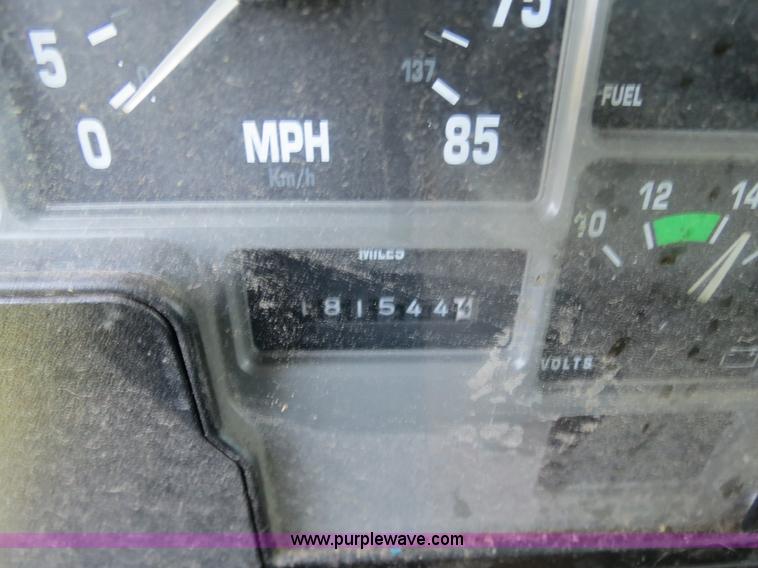 image for item B4750 1998 International 4700 flatbed truck