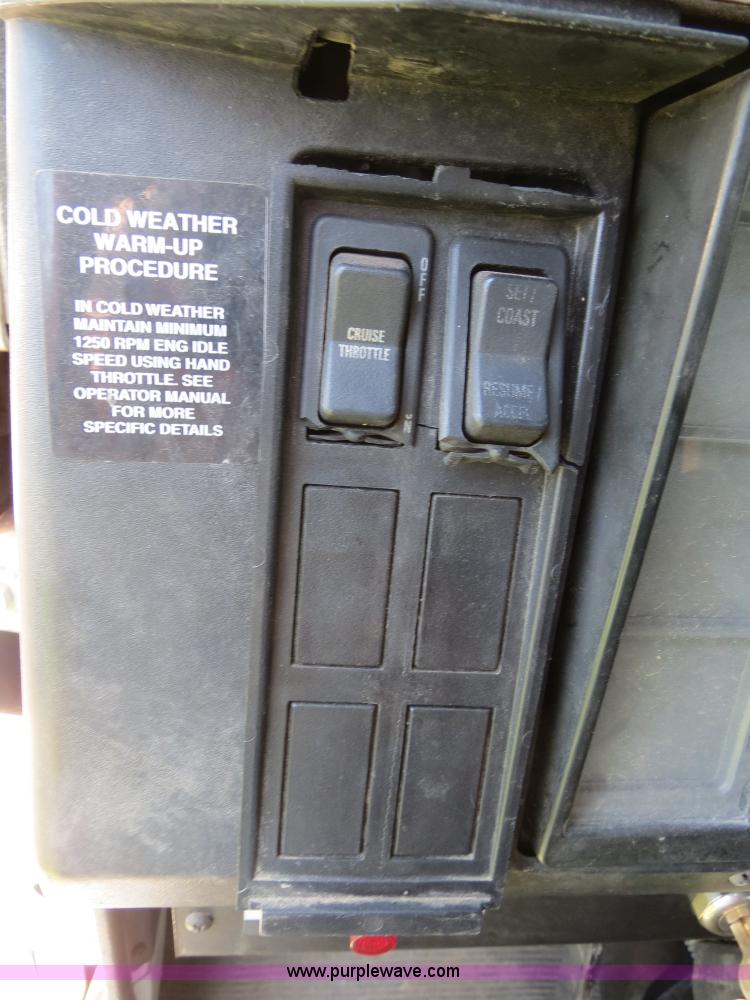 image for item B4750 1998 International 4700 flatbed truck