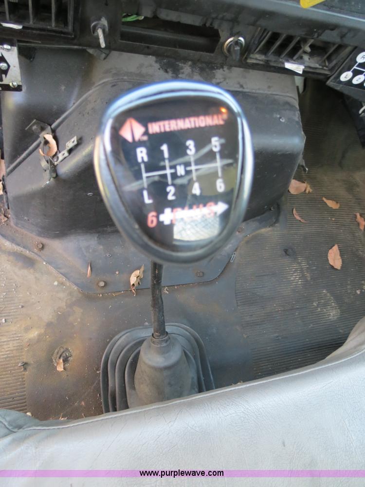 image for item B4750 1998 International 4700 flatbed truck