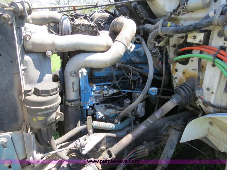 image for item B4750 1998 International 4700 flatbed truck