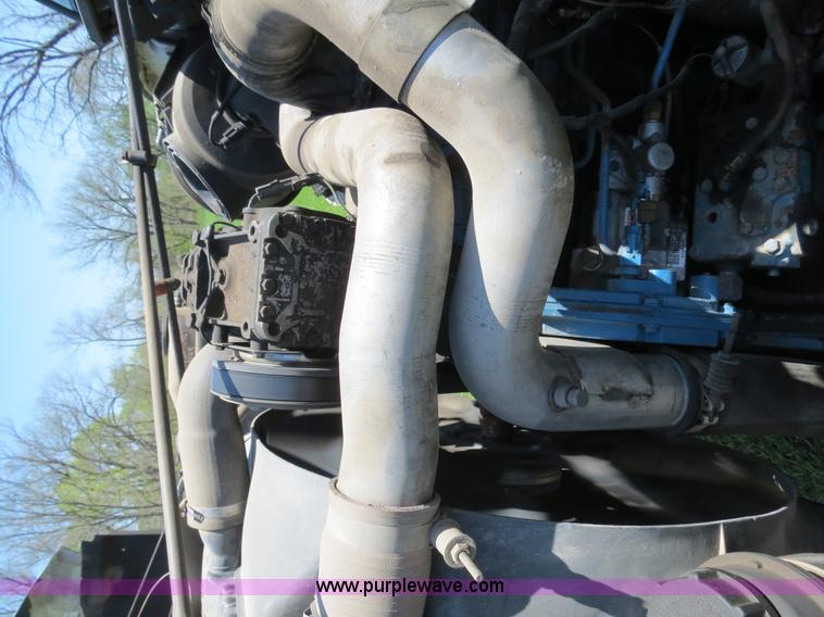 image for item B4750 1998 International 4700 flatbed truck