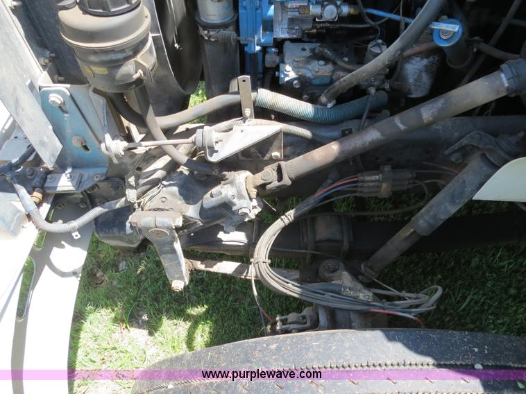 image for item B4750 1998 International 4700 flatbed truck