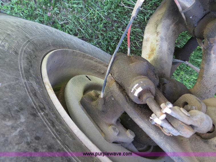 image for item B4750 1998 International 4700 flatbed truck