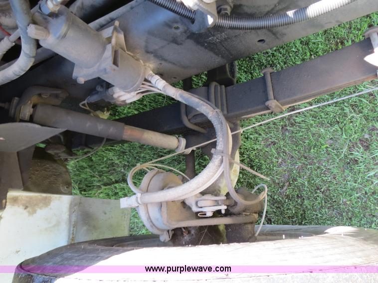 image for item B4750 1998 International 4700 flatbed truck