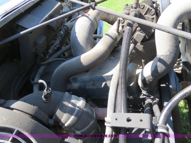 image for item B4750 1998 International 4700 flatbed truck