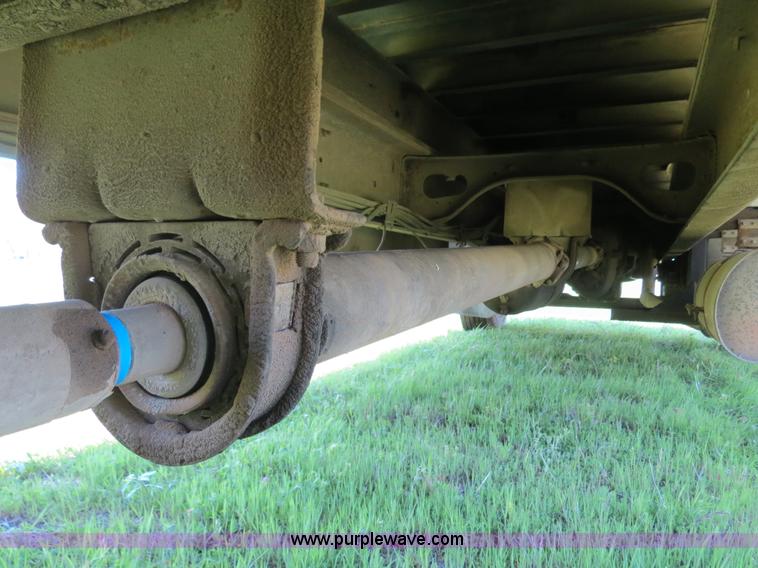 image for item B4750 1998 International 4700 flatbed truck