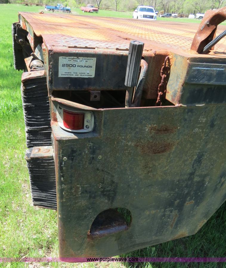 image for item B4750 1998 International 4700 flatbed truck