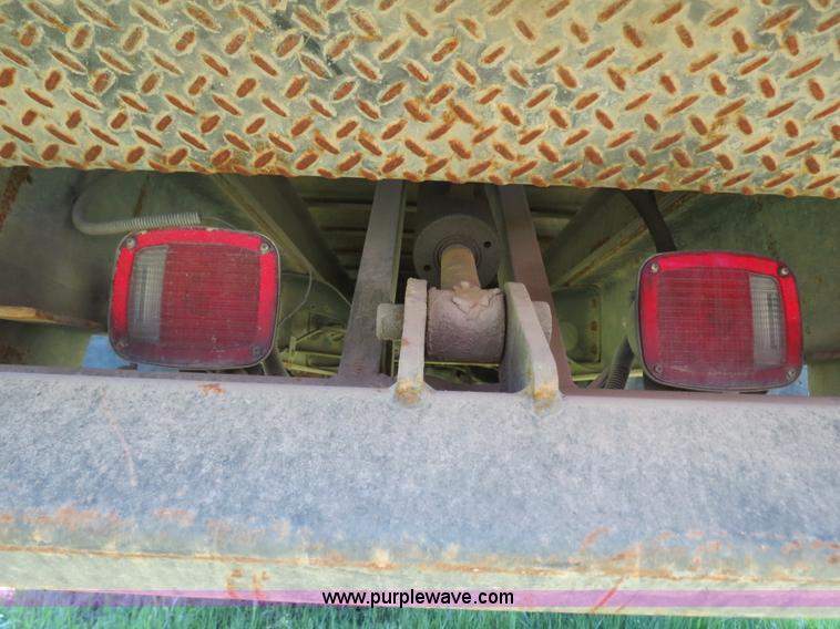 image for item B4750 1998 International 4700 flatbed truck