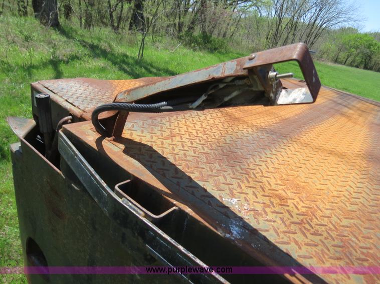 image for item B4750 1998 International 4700 flatbed truck