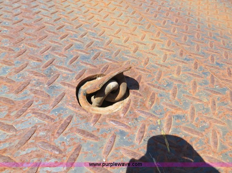 image for item B4750 1998 International 4700 flatbed truck