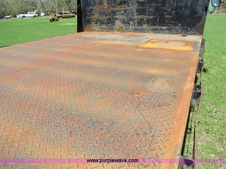 image for item B4750 1998 International 4700 flatbed truck