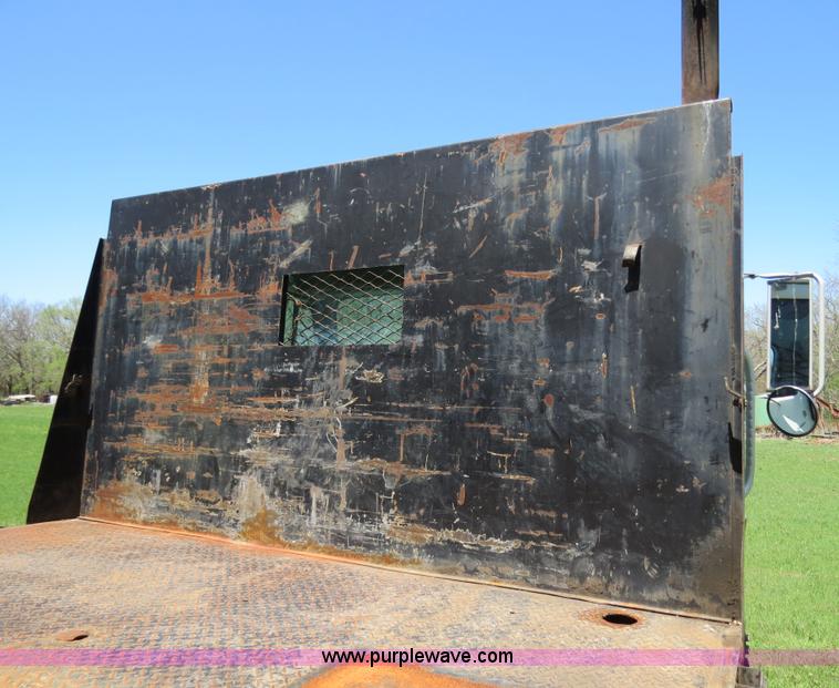 image for item B4750 1998 International 4700 flatbed truck