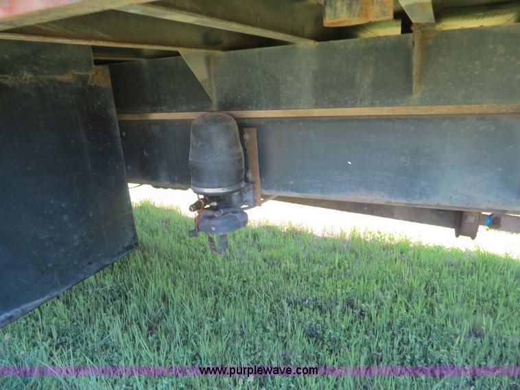 image for item B4750 1998 International 4700 flatbed truck