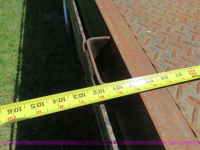 image for item B4750 1998 International 4700 flatbed truck