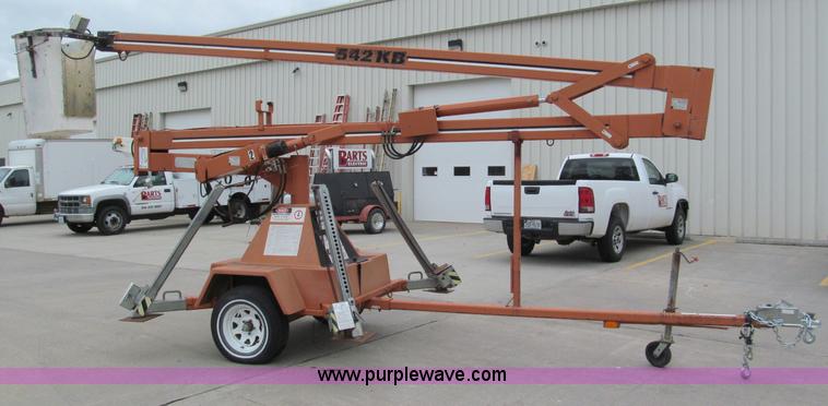 image for item E5858 1999 KB 542 Unilift towable boom lift