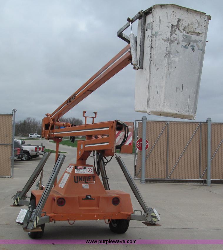 image for item E5858 1999 KB 542 Unilift towable boom lift