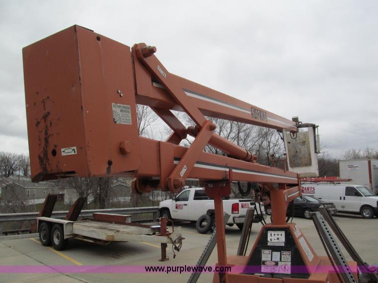 image for item E5858 1999 KB 542 Unilift towable boom lift