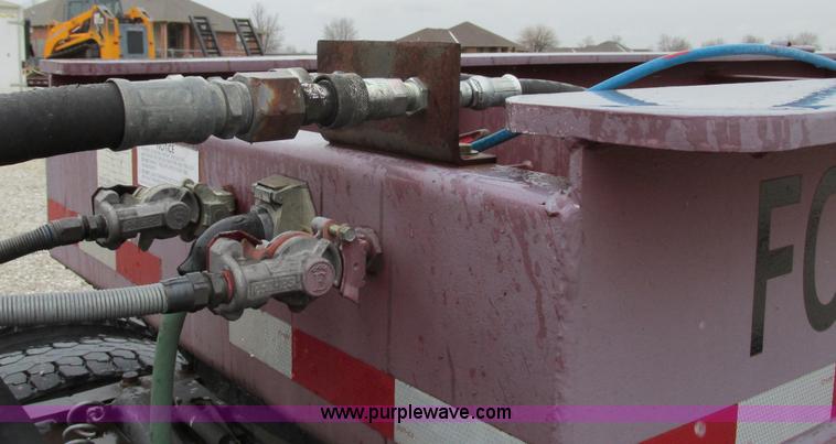 image for item F4779 1995 Fontaine TB50 50 ton detach triple axle lowboy trailer