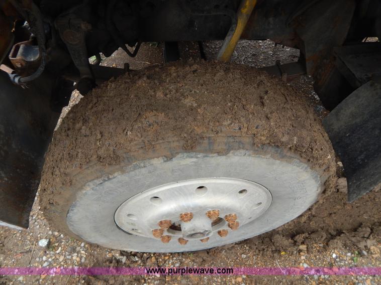 image for item G3117 1988 Ford L8000 roll off truck