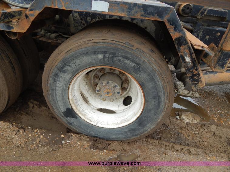 image for item G3117 1988 Ford L8000 roll off truck