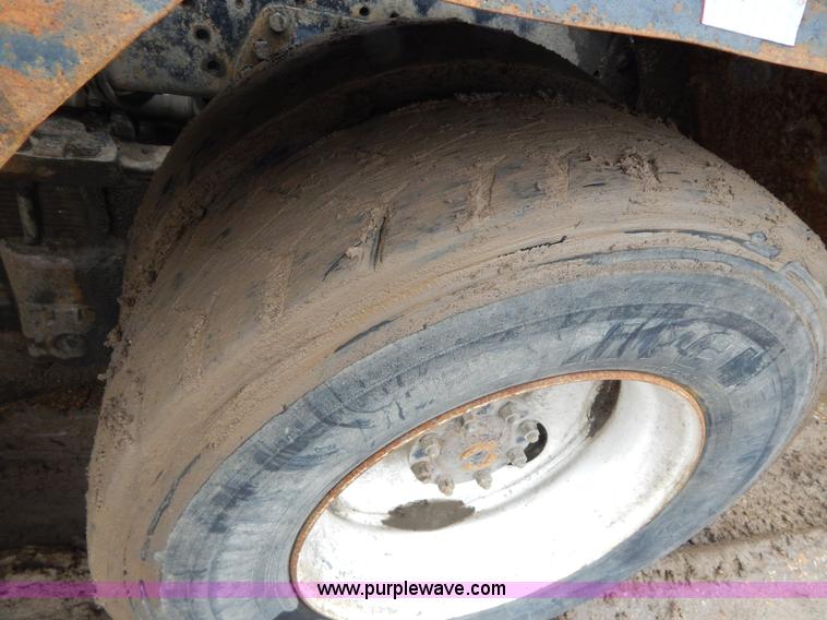 image for item G3117 1988 Ford L8000 roll off truck