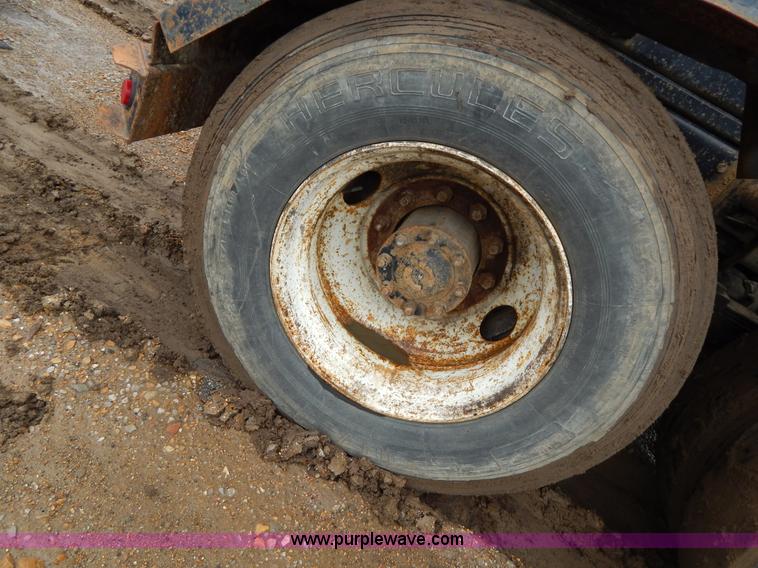 image for item G3117 1988 Ford L8000 roll off truck