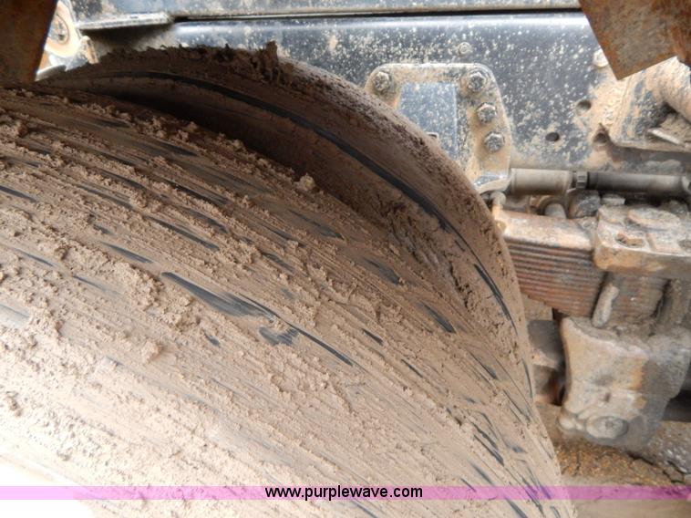 image for item G3117 1988 Ford L8000 roll off truck