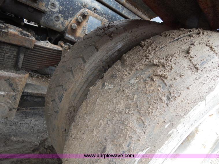 image for item G3117 1988 Ford L8000 roll off truck